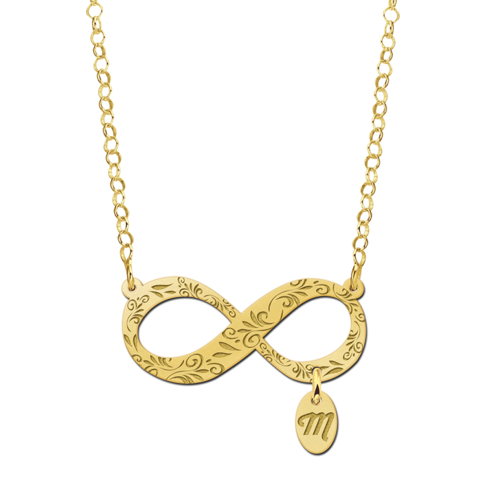 Infinity Schmuck aus Gold mit Ornament und Initial