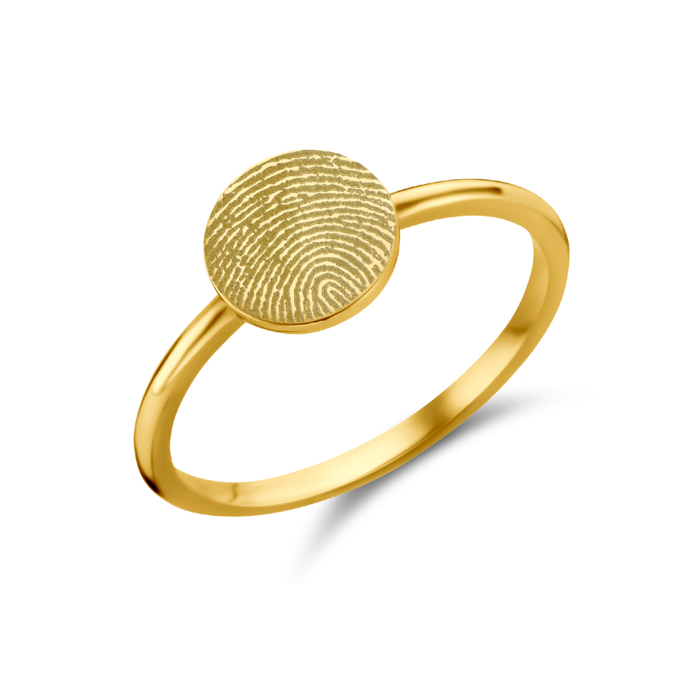 Goldener Siegelring disc mit Fingerabdruck